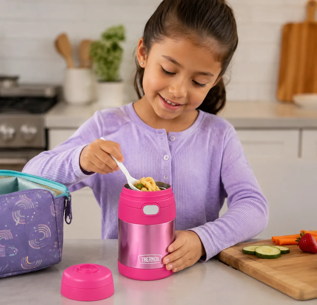 THERMOS FUNTAINER 10oz kids food jar in Pink with insulated body and foldable spoon.