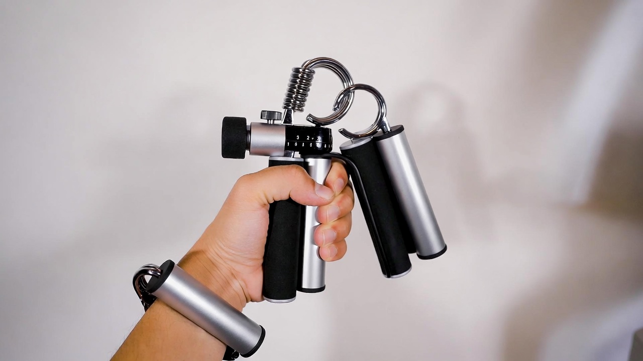 FitBeast Grip Strengthener Kit with five components including adjustable grip strengtheners, finger exerciser, grip ring, and flexor band.