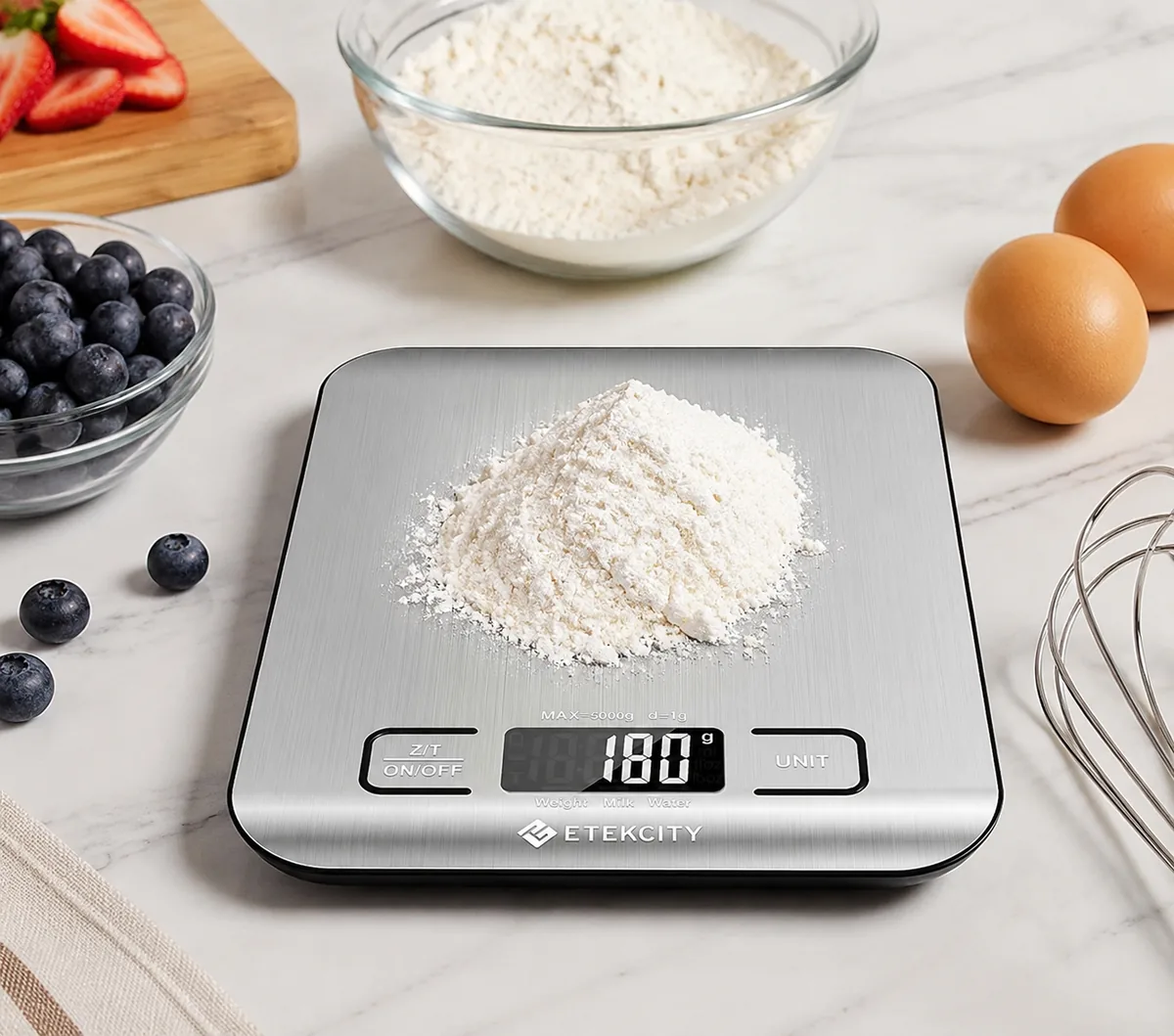 Etekcity Food Kitchen Scale shown on a kitchen counter with its stainless steel weighing surface and backlit LCD display.